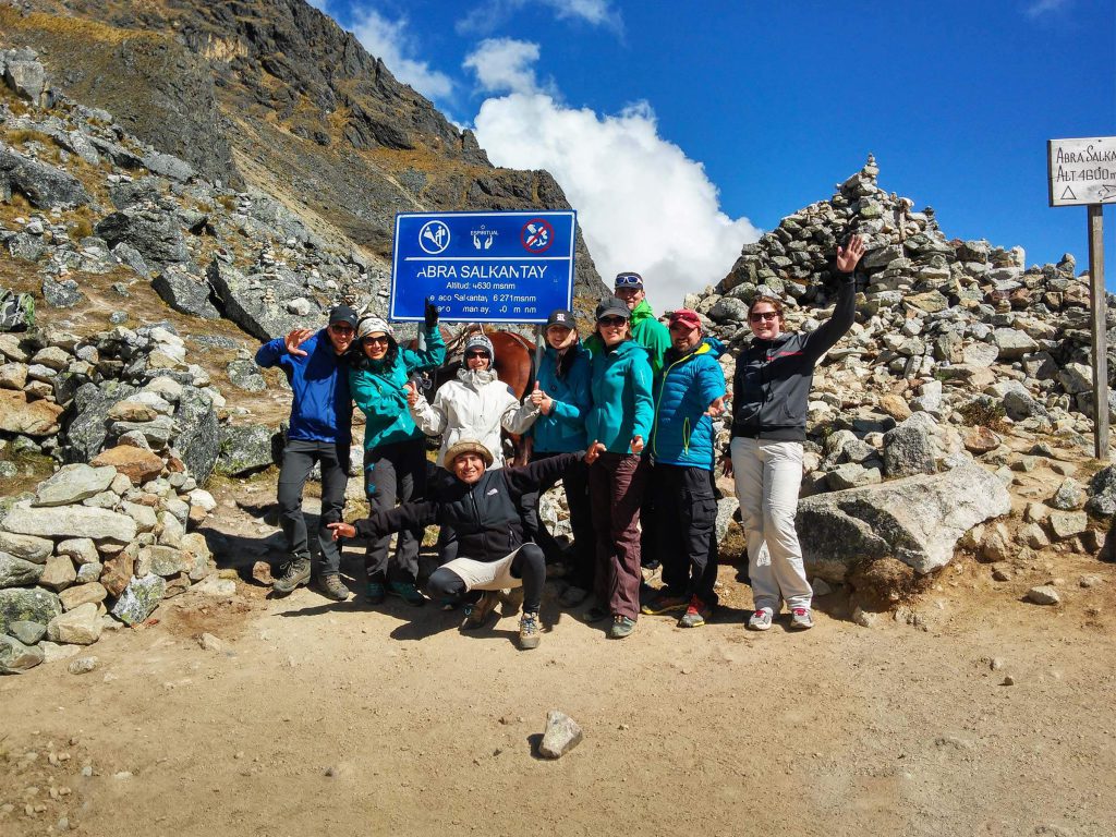 Inca Trail Sold Out? 2027 Alternatives Ranked by How Close They Feel 2 Hiking group celebrating at the Salkantay pass sign