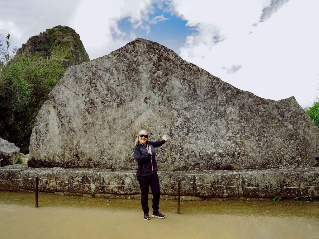Machu Picchu Tickets 2027: Prices, When They Go on Sale and How to Buy 3 A visitor beside the Sacred Rock in the lower sector of Machu Picchu