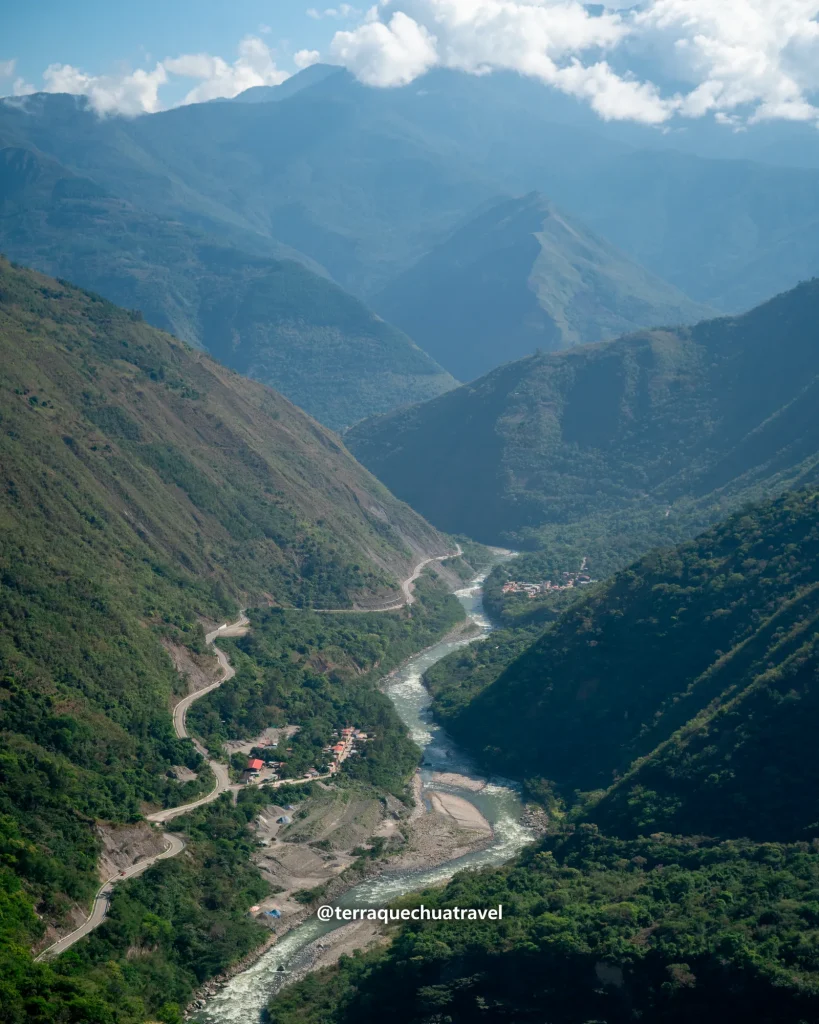 The Urubamba River winding through a deep green valley seen from the Inca Jungle trek
