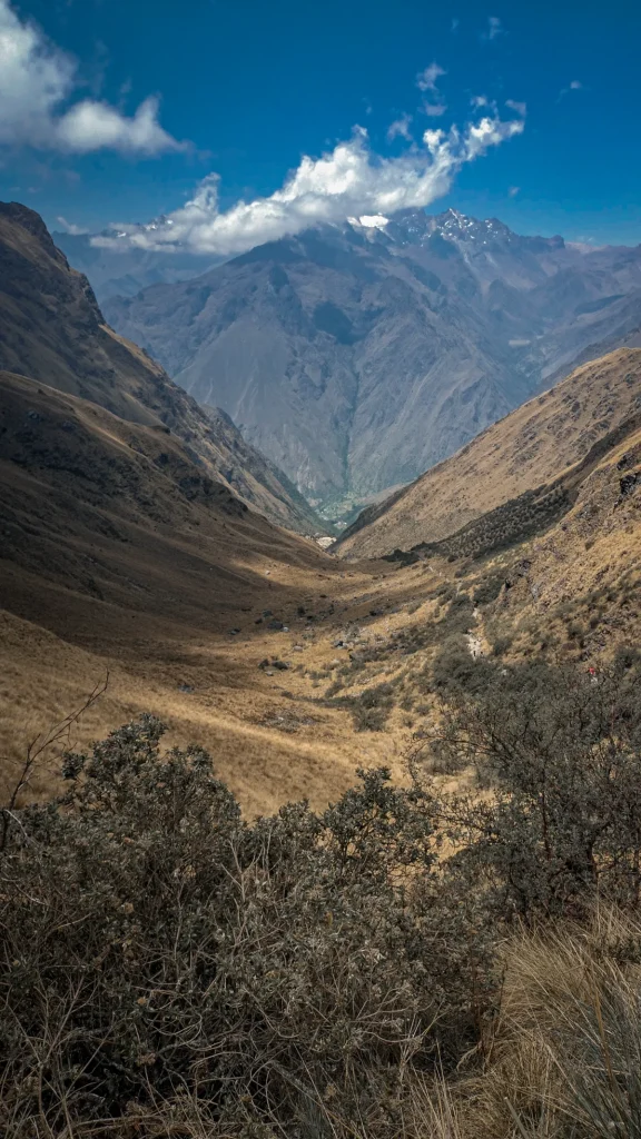 Dry Andean valley under a snowy summit seen from the Inca Trail